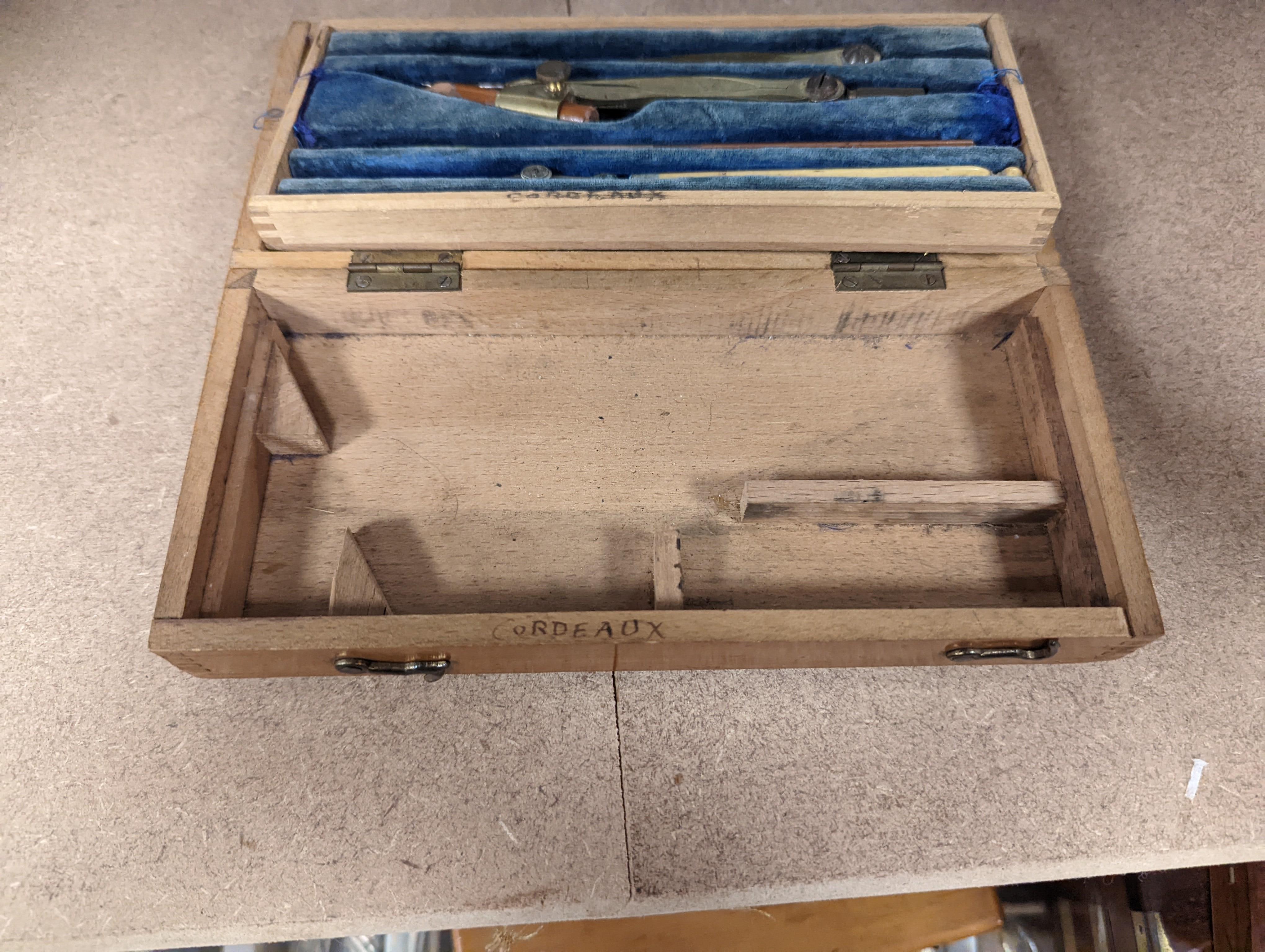 A collection of mahogany cased drawing instruments (8)